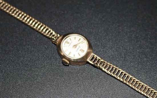 Ladies 9ct gold accurist watch with 9ct gold strap
